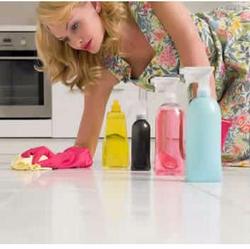 Lady cleaning sealed tiles